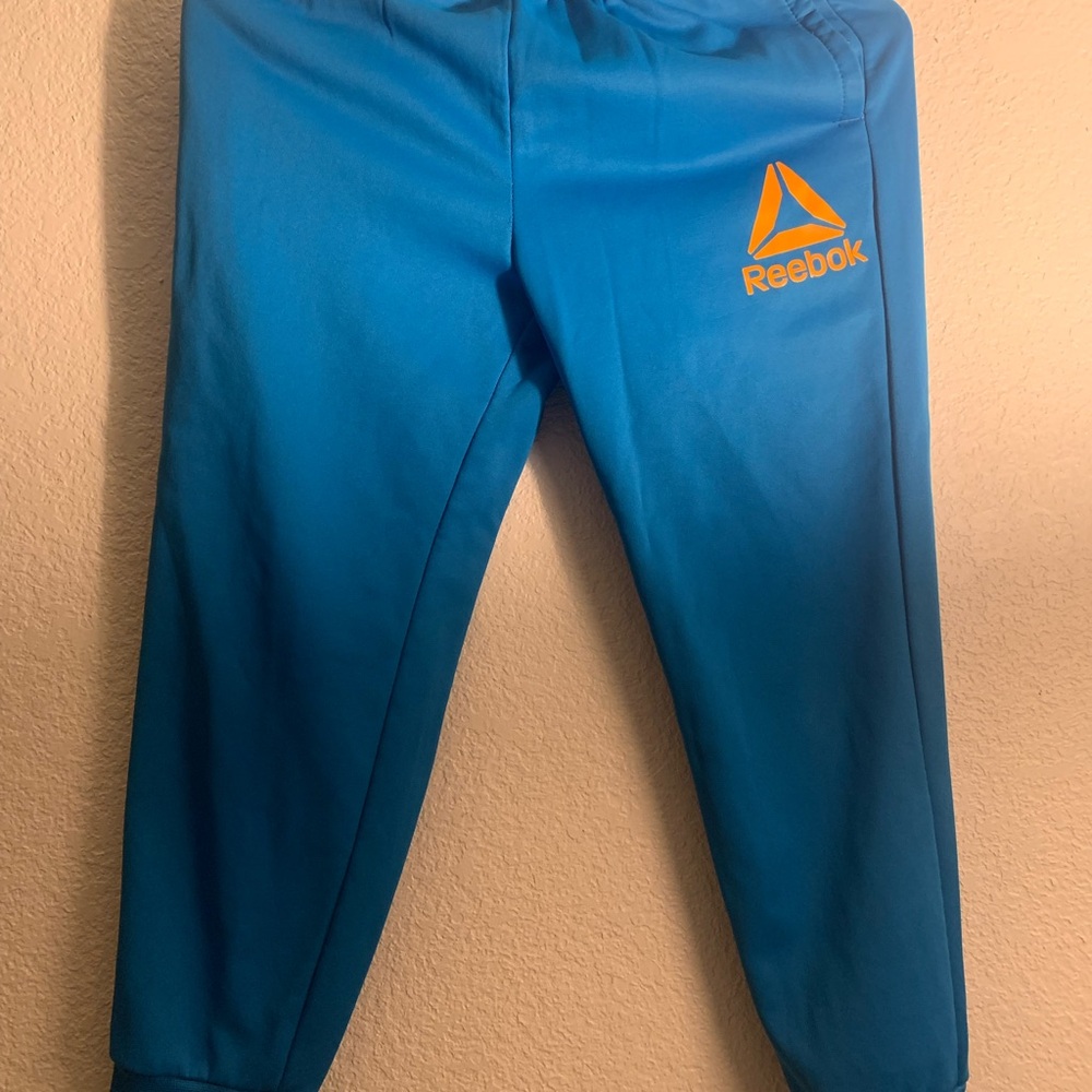 Reebok Blue Joggers with Orange Logo